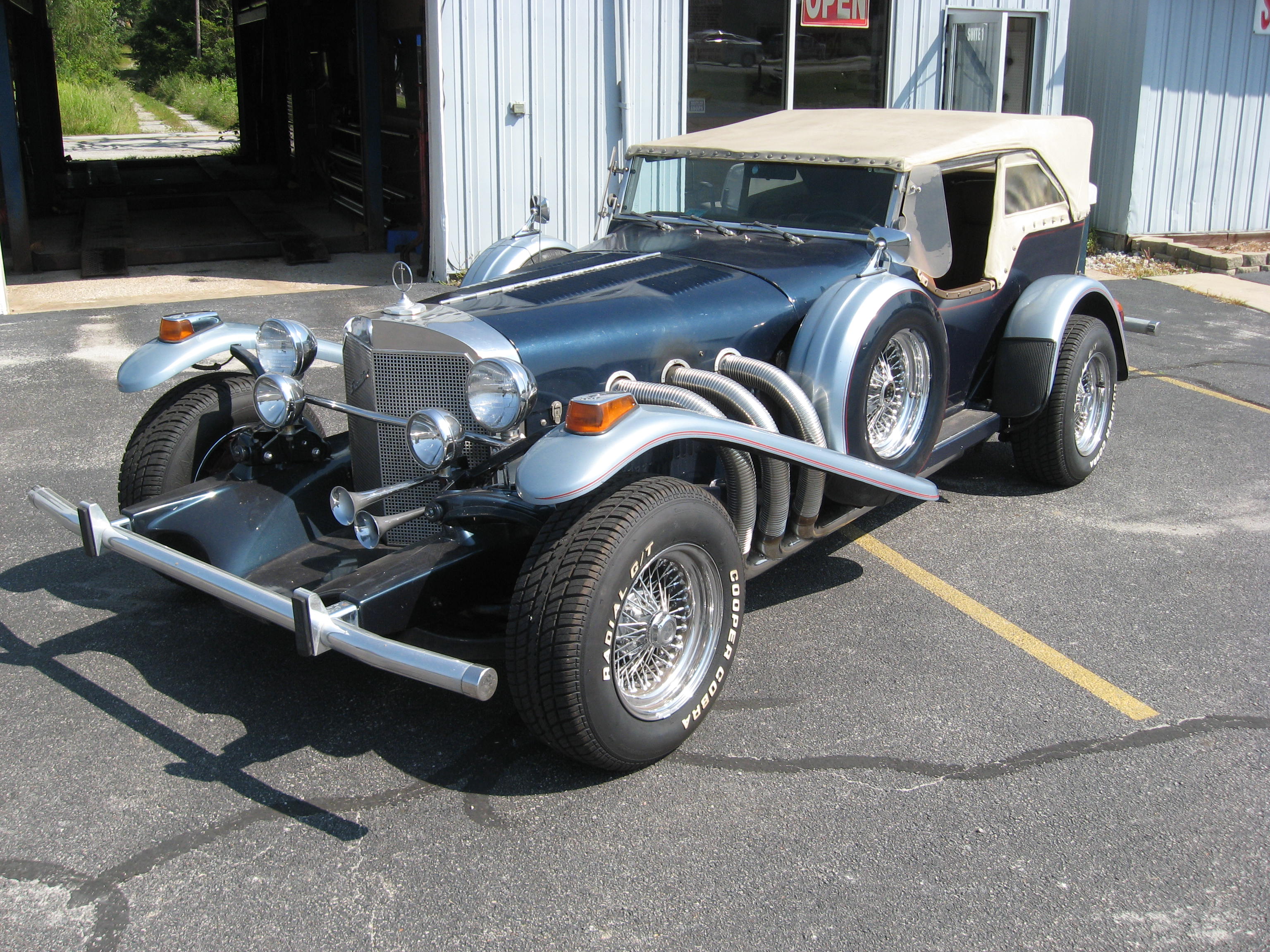 Automotive Exhaust Specialists work